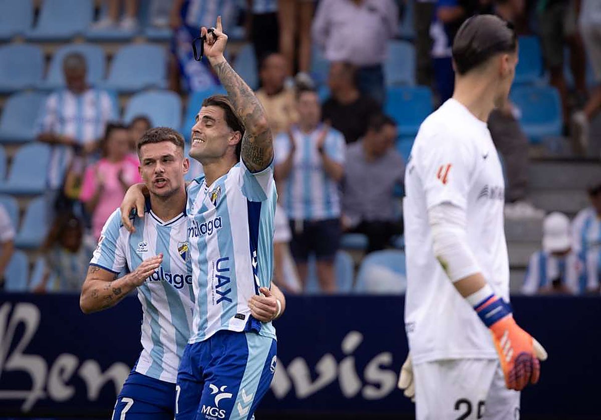 Rafa y Jauregi, tras el último gol malaguista el domingo.