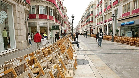 Estafa de las falsas sillas de Semana Santa en calle Larios: dos condenados por cobrar reservas que no existían