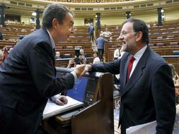 Zapatero y Rajoy bromean sobre sus sustos aéreos