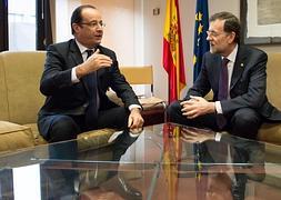 Hollande, junto a Rajoy. / Afp