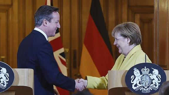 David Cameron y Angela Merkel. 