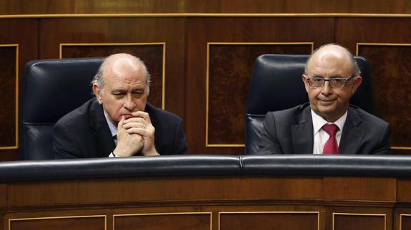 Jorge Fernández Díaz y Cristóbal Montoro. 