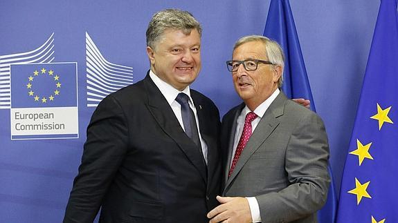 El presidente de la CE,Jean Claude Juncker, y el presidente ucraniano, Petro Poroshenko. 