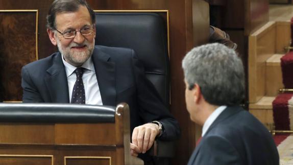 Mariano Rajoy y Francesc Homs. 