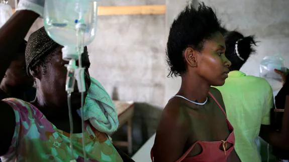 Una haitiana con síntomas de cólera. 