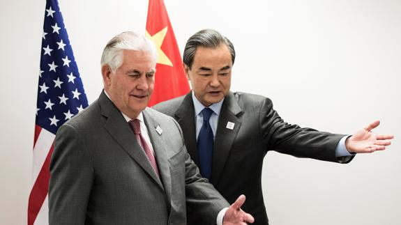 Rex Tillerson y Wang Yi.