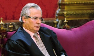 Garzón, en el banquillo. / Efe