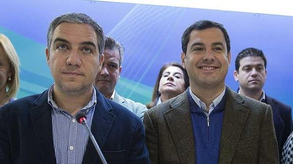 Bendodo, junto a Juanma Moreno, durante la presentación de la candidatura del PP por Málaga. 