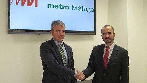 El director general de Metro de Málaga, Fernando Lozano, y el director territorial de Orange para Andalucía y Extremadura, Daniel Morales