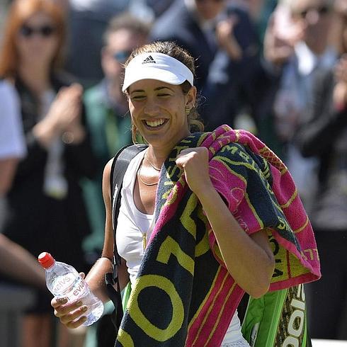 La tenista española Garbiñe Muguruza celebra su victoria.