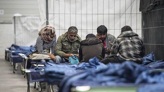 Refugiados procedentes en un centro de acogida de Rotemburgo, Alemania. 