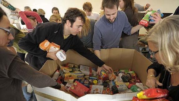 Comercios de El Perchel recogerán alimentos y juguetes para los más necesitados