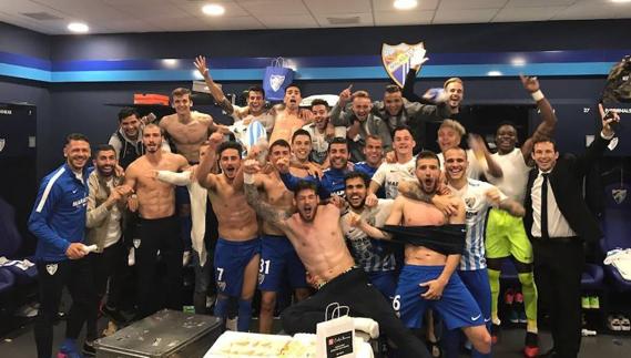 El vestuario del Málaga celebra la victoria