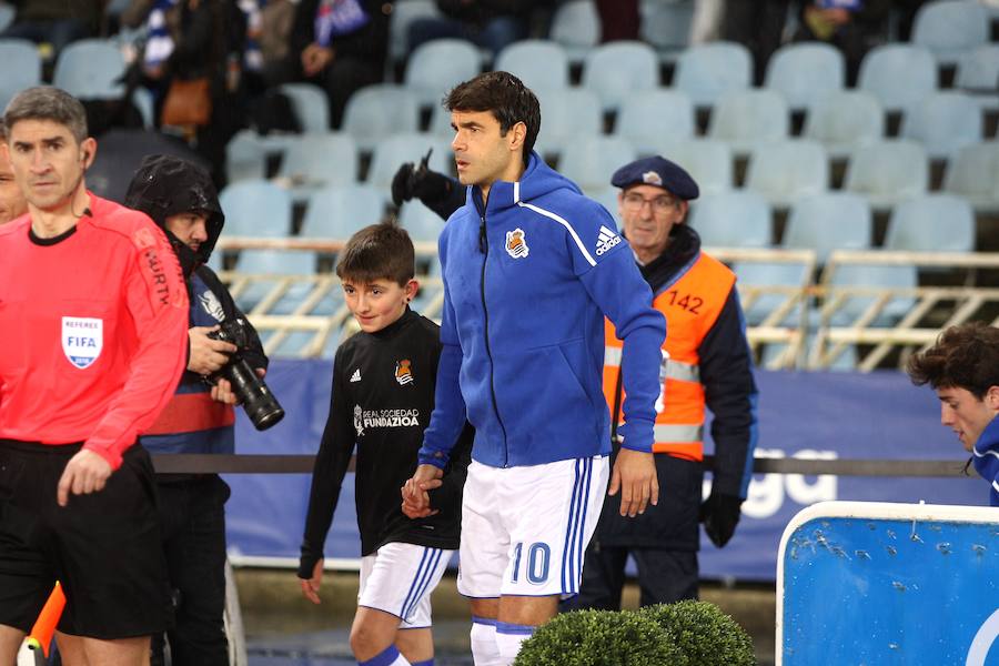 Las imágenes del partido que Real y Deportivo han disputado bajo la lluvia en el estadio de Anoeta