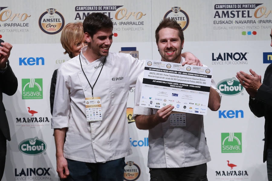Jorge Otxoa y Félix Jiménez, del restaurante El Mercao de Pamplona, han ganado el XIII Campeonato de Pintxos de Euskal Herria, celebrado en el Kursaal de San Sebastián, con una propuesta bautizada como «Camarón de la Concha», elaborada de dos tortillas de camarón que encierran una elaboración de txangurro a la donostiarra.