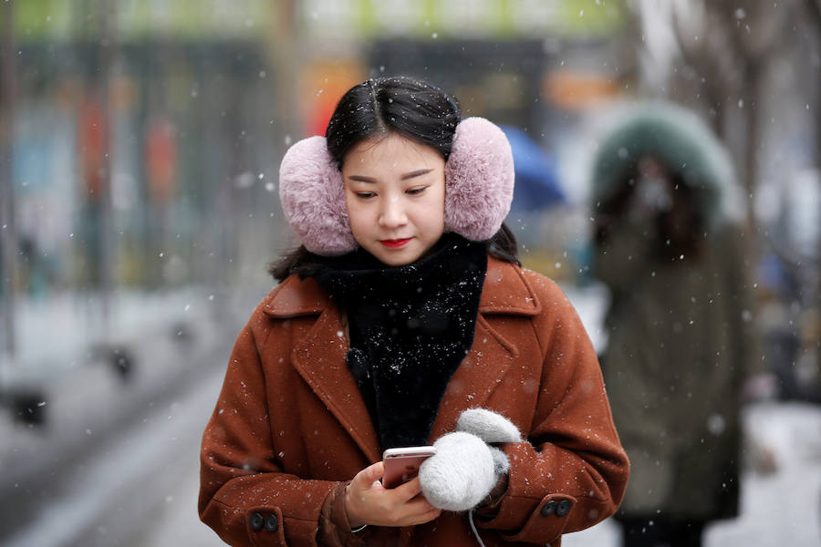 Pakín ha celebrado el desfile militar con la plaza de Tiananmen y sus alrededores bajo un manto blanco de nieve.