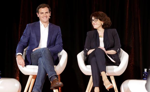 Rivera, junto a Rodríguez en un acto en Madrid.