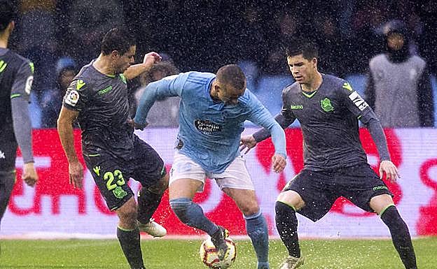 Zubeldia y Sangalli, en busca del balón. 