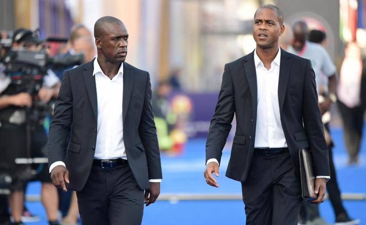 Clarence Seedorf y Patrick Kluivert, paseando.