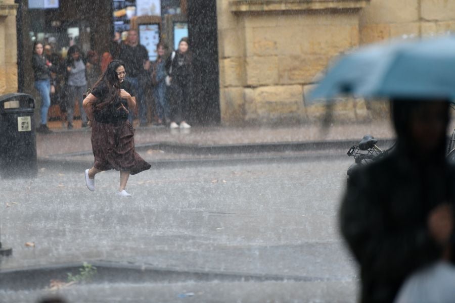 Fotos: Chaparrón de mediodía