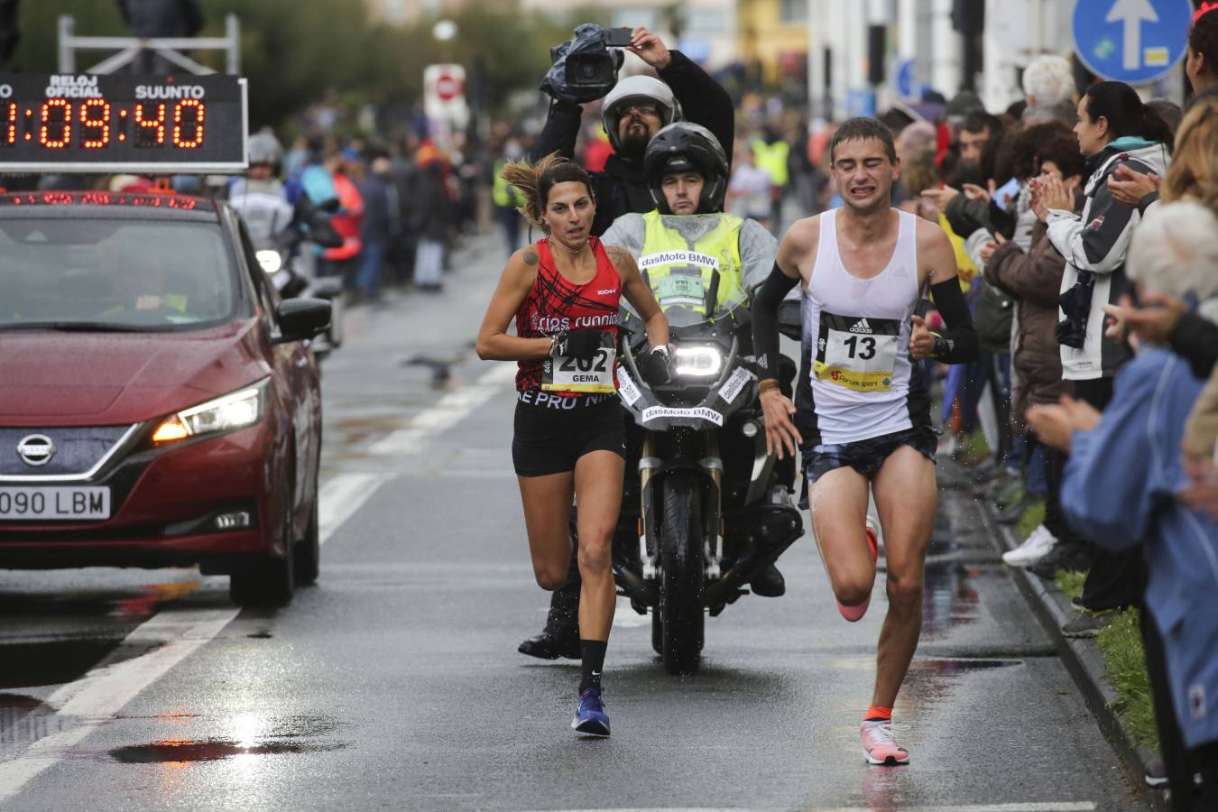 Fotos: Las llegadas a meta de los participantes en la Behobia - San Sebastián