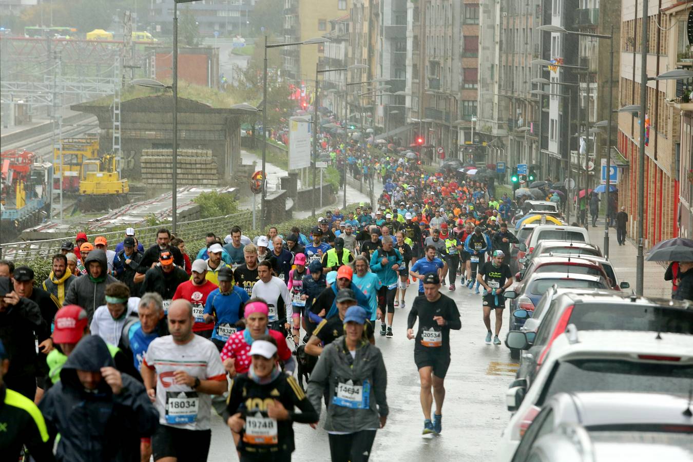 Fotos: Los corredores, a su paso por Pasaia y Herrera en la Behobia - San Sebastián