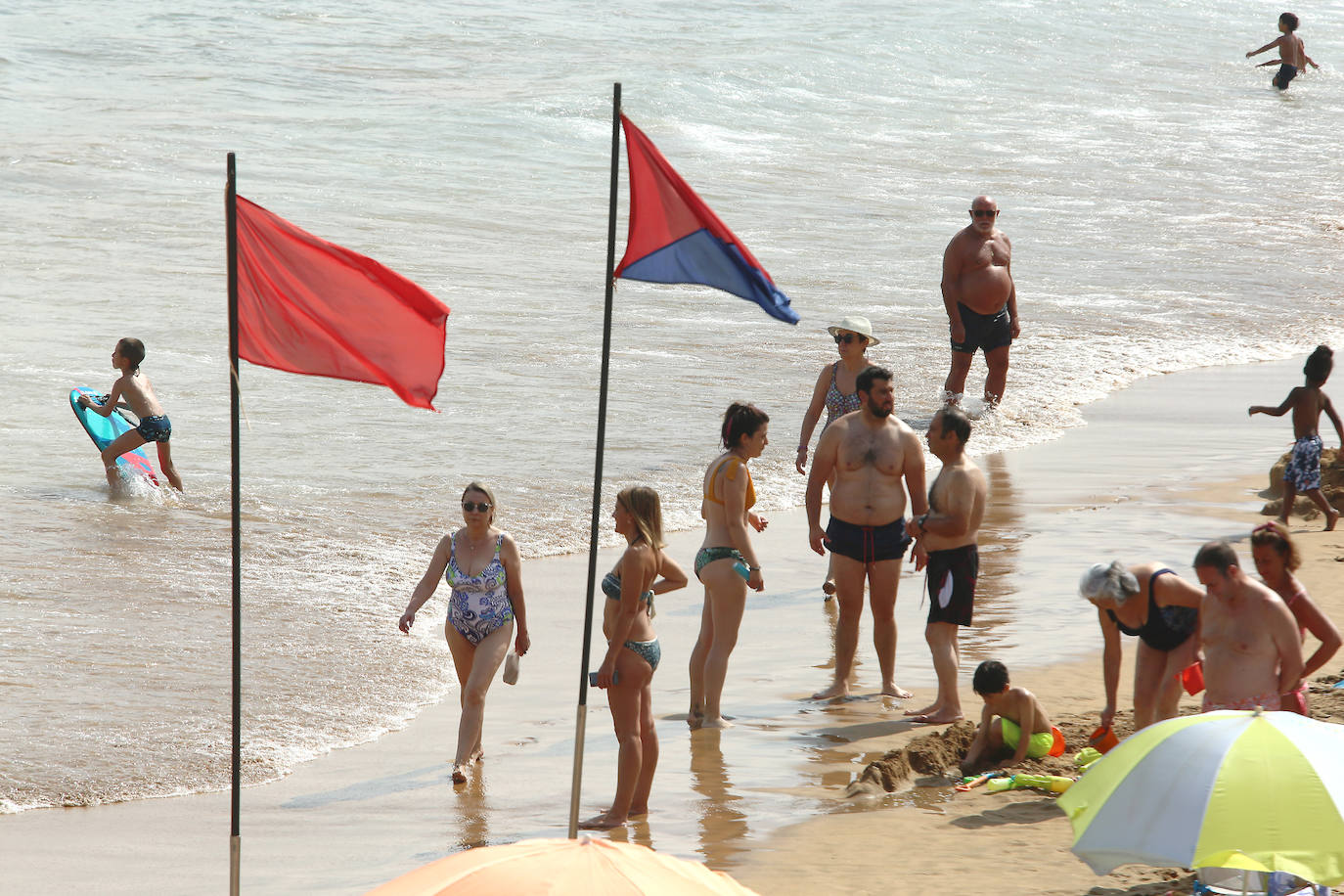 Fotos: Un domingo caluroso y a remojo