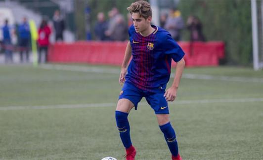 Robert Navarro en un partido como cadete del Barça.