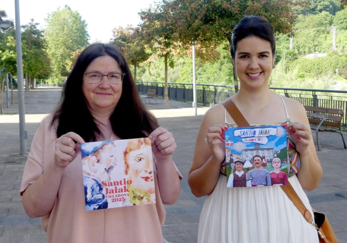 Begoña Arancon e Irati Santiago posan con los carteles ganadores.