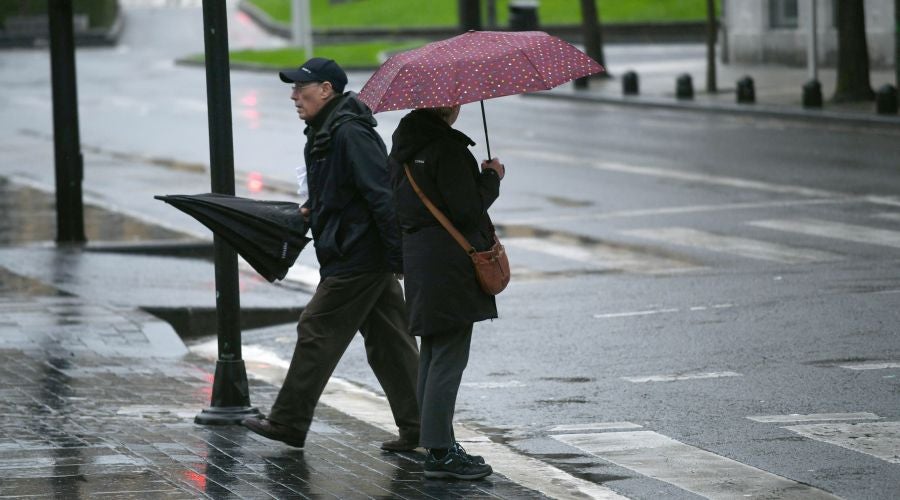 Fotos: Jornada gris y lluviosa