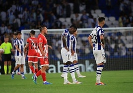 Becker, cabizbajo, y Brais al finalizar el partido de este domingo.