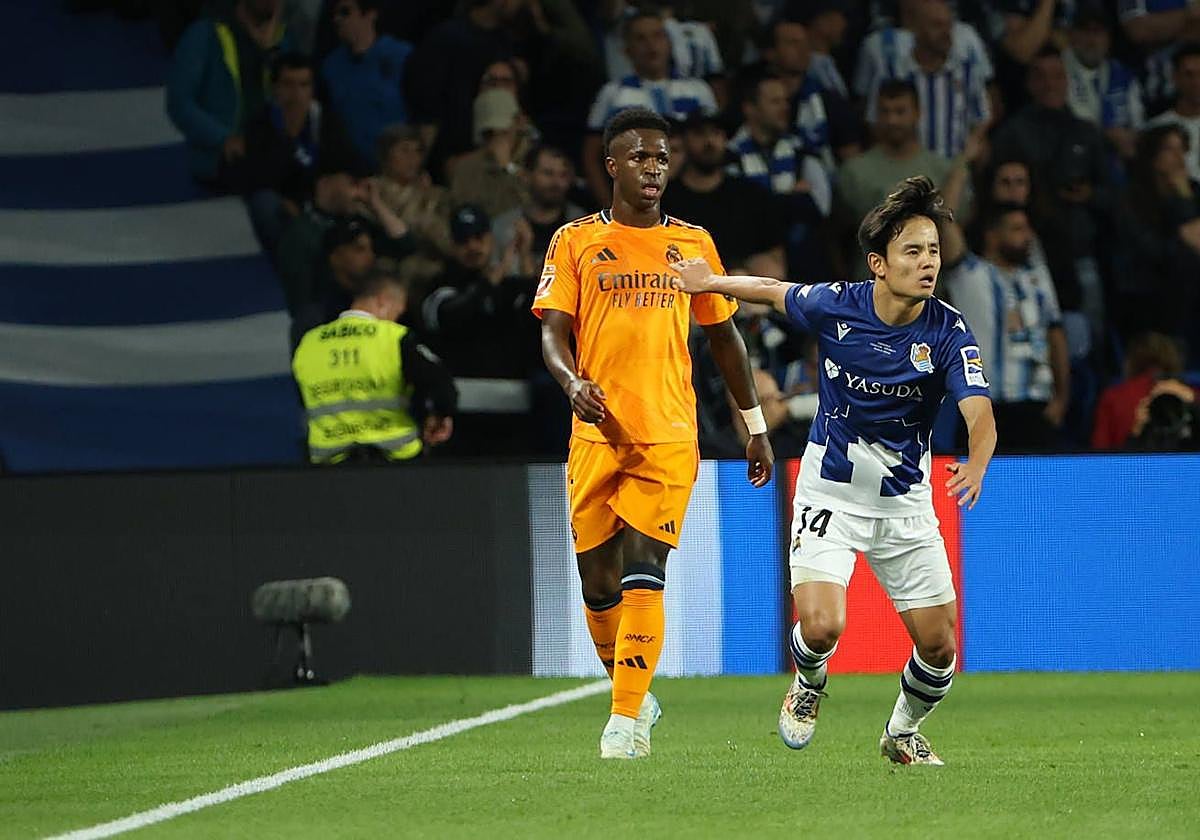 Take Kubo y Vinicius, en un lance del partido entre la Real Sociedad y el Real Madrid en el Reale Arena.