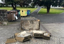 Murete de Santa cruz arrollado por el camión de la basura.