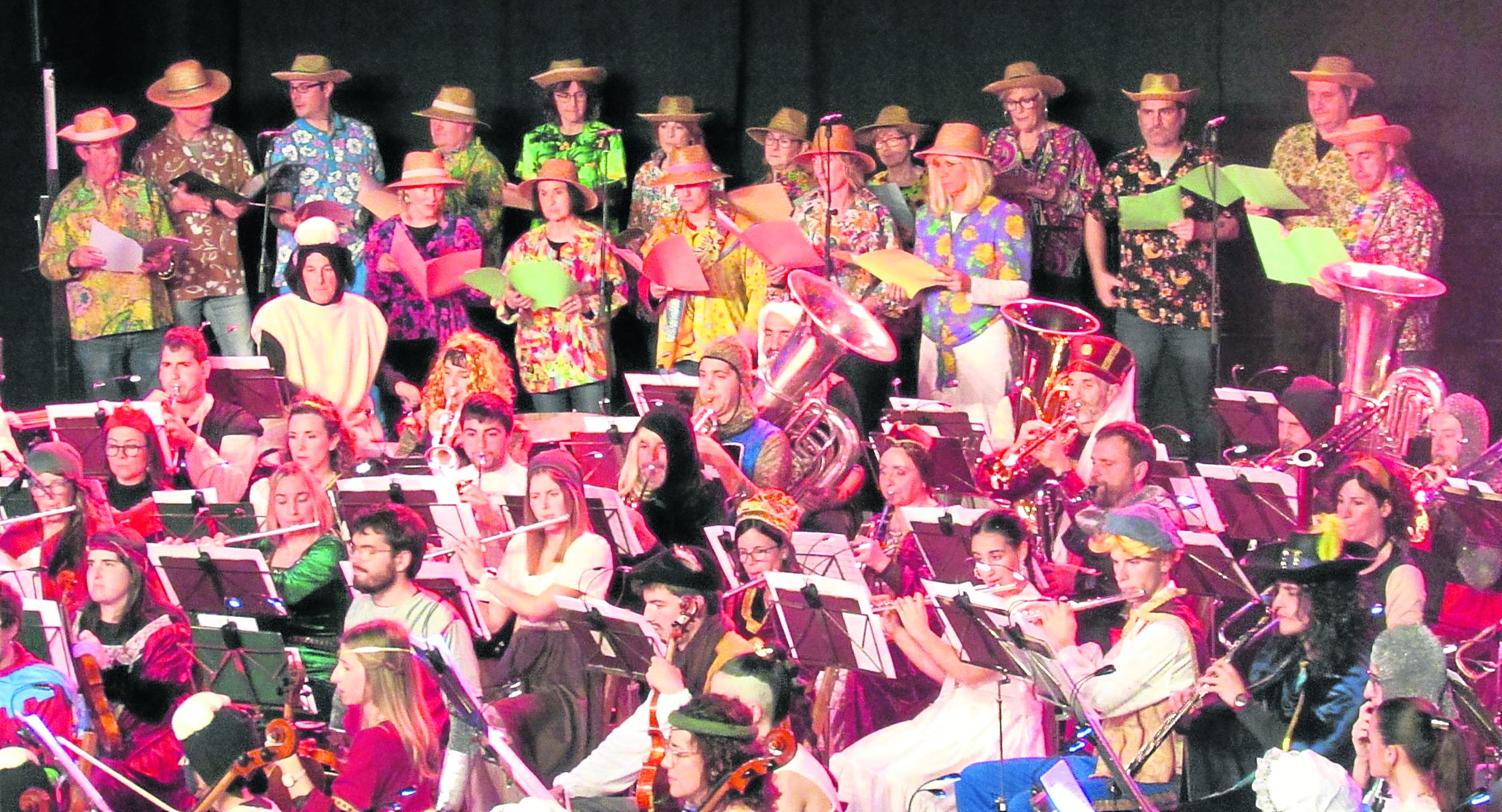 Banda y Orquesta junto a Aritzeta y Kulunka más actores aficionados e invitados ponen en pie el popular Concierto de Carnaval.
