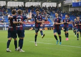 Bautista y Corpas celebran un gol ante el Córdoba.