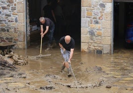 Afectados por la tromba de agua de este viernes.