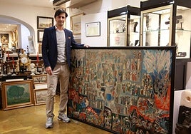 Helder Lobelos, junto al cuadro de José Sarriegui que realizó para el ábside del santuario pero que no presentó al concurso.