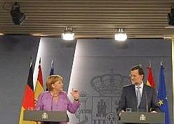 Merkel y Rajoy, durante la rueda de prensa. / Reuters