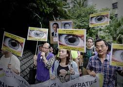 Manifestación en Hong Kong en apoyo a Edward Snowden. / Philippe Lopez (Afp)