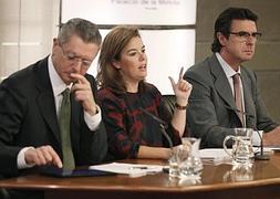 Ruiz-Gallardón, Sáenz de Santamaria y Soria. / Efe