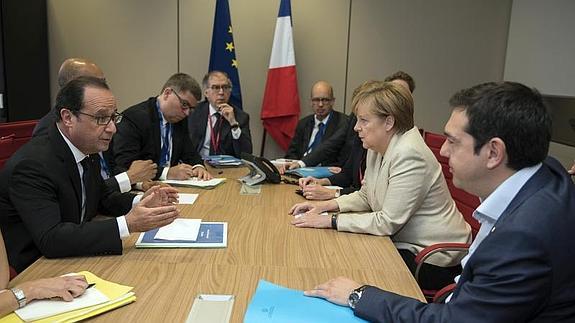 Hollande, Merkel y Tsipras. 