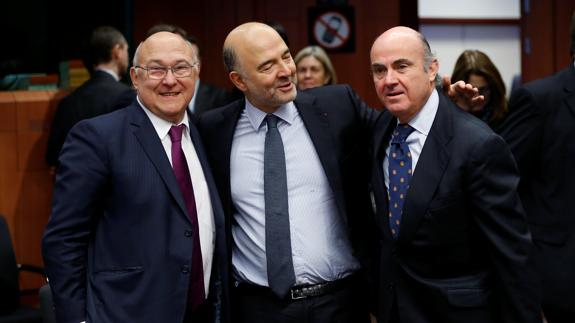 Michel Sapin, Pierre Moscovici y Luis de Guindos.