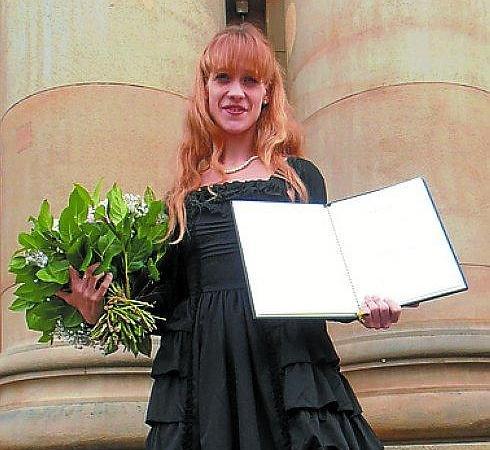 Amatriain con el título.