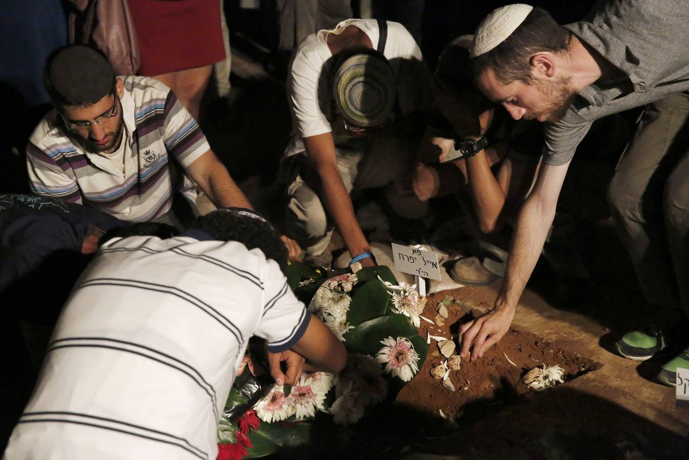 Funeral de los tres jóvenes israelíes asesinados. 