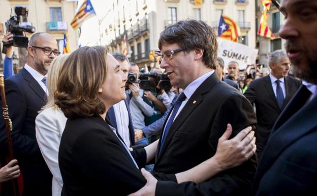 Ada Colau y Carles Puigdemont.