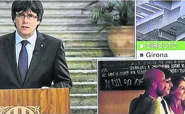 Puigdemont, de comida con amigos mientras salía en televisión