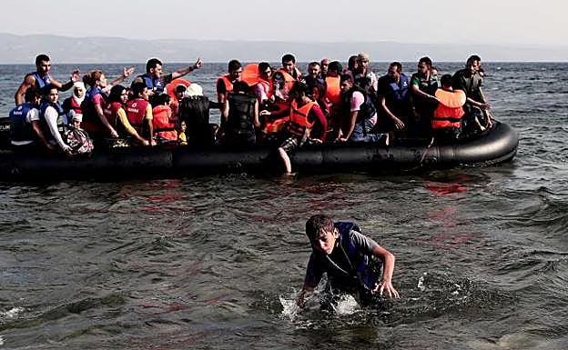 Un grupo de sirios llegan a Lesbos. 
