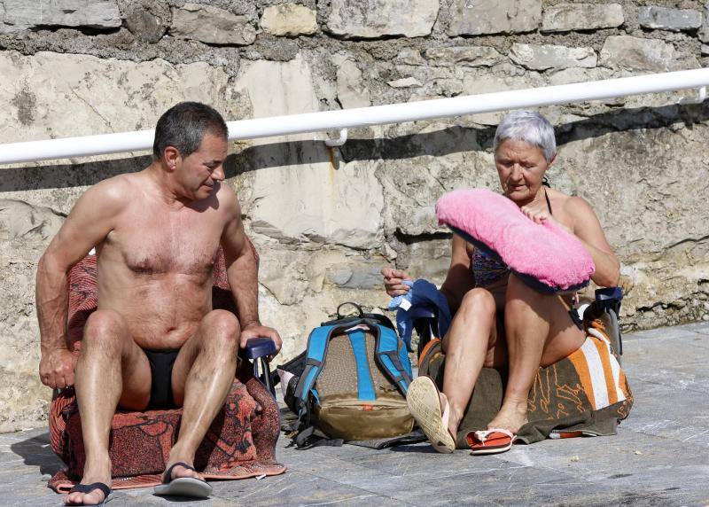 Fotos: Gijón, dispuesto a disfrutar del sol y del calor