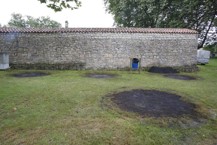 Los vecinos de Granda continuaron celebrando las fiestas de Santa Ana con una corderada y una animada carrera de obstáculos con la sidra como protagonista