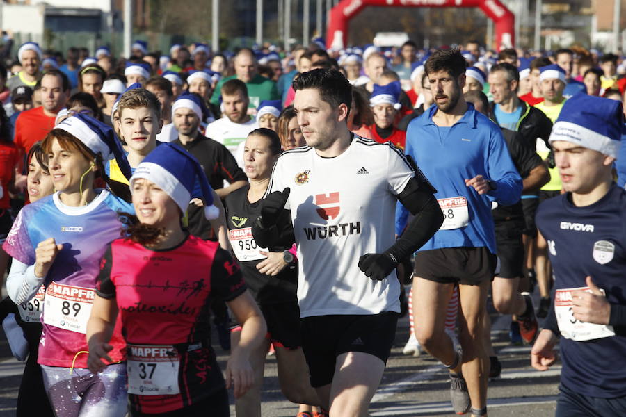 Fotos: ¿Estuviste en la Carrera Ppopular de Nochebuena? ¡Búscate!